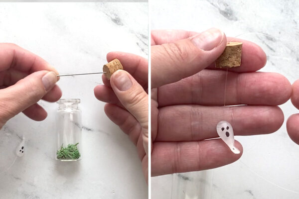 Using a needle to thread fishing line through the cork stopper.