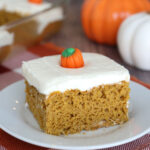 Slice of pumpkin cake on a plate.