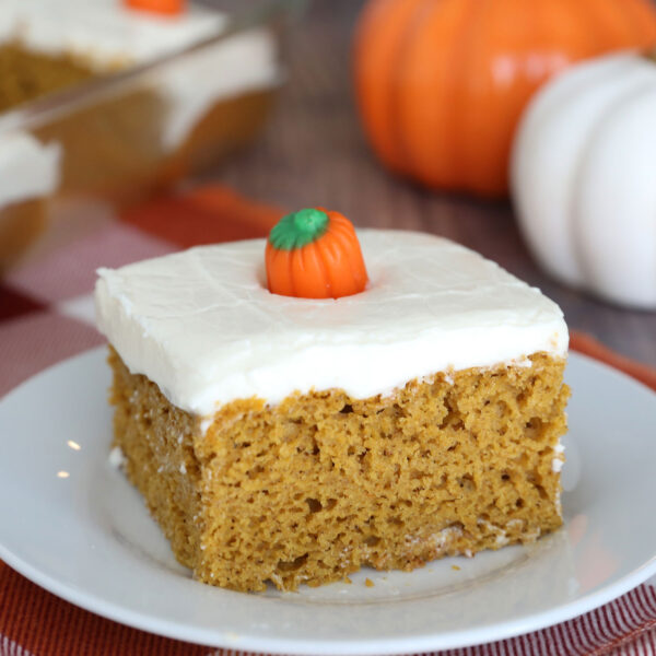 Slice of pumpkin cake on a plate.