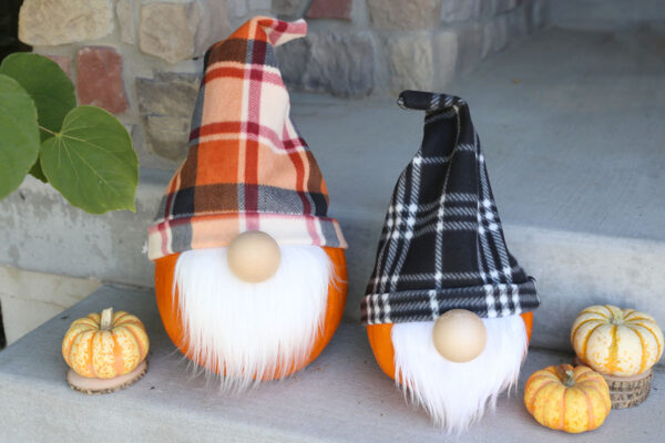 Pumpkins decorated to look like Halloween gnomes.