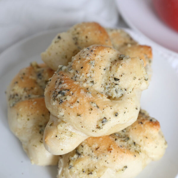 Garlic knots on a plate.