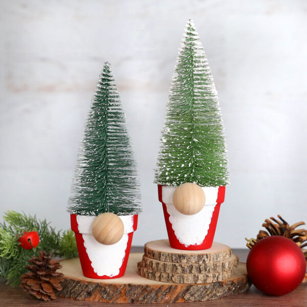 Mini Christmas tree gnomes in flower pots.