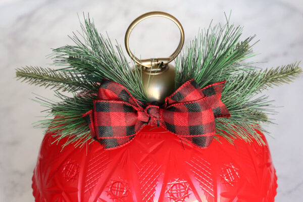 Ribbon bow glued to ornament.
