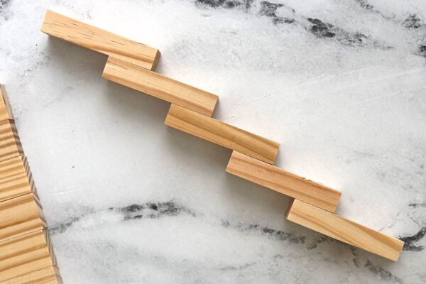 Five blocks glued together, each overlapped one inch.