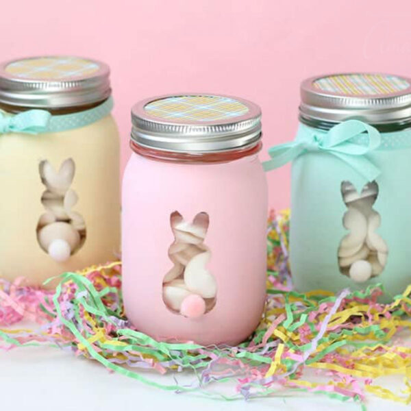 Painted mason jars with Easter bunnies on them.