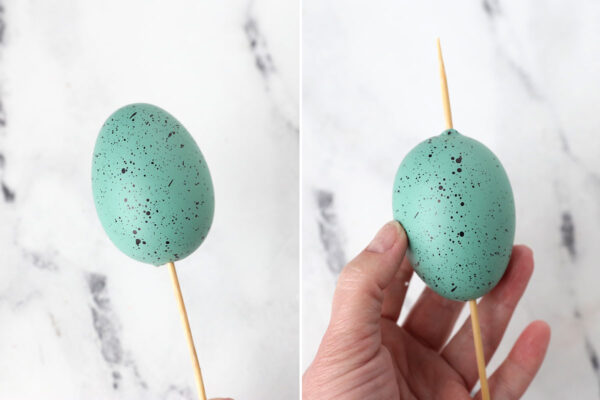 Poking a wood skewer through the center of a styrofoam Easter egg.