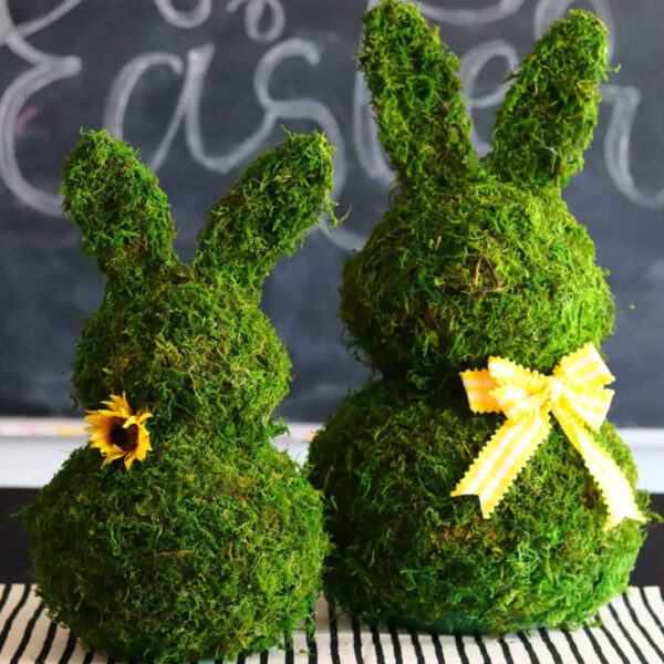 Large bunnies covered in moss decoration.