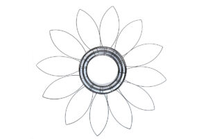 Six bunny wreath forms stacked to create sunflower shape.