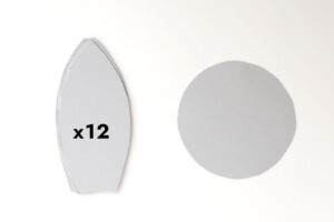 Twelve petal templates cut from poster board; one circle cut from poster board.