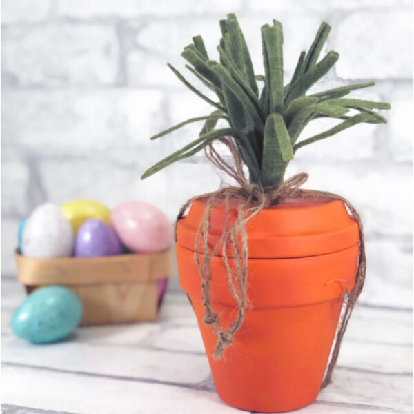 Carrot craft made from terra cotta pot.