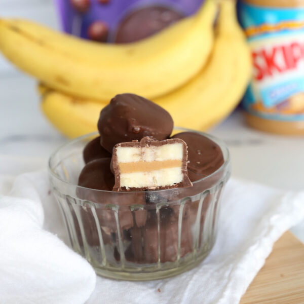 Bowl of frozen chocolate peanut butter banana bites.