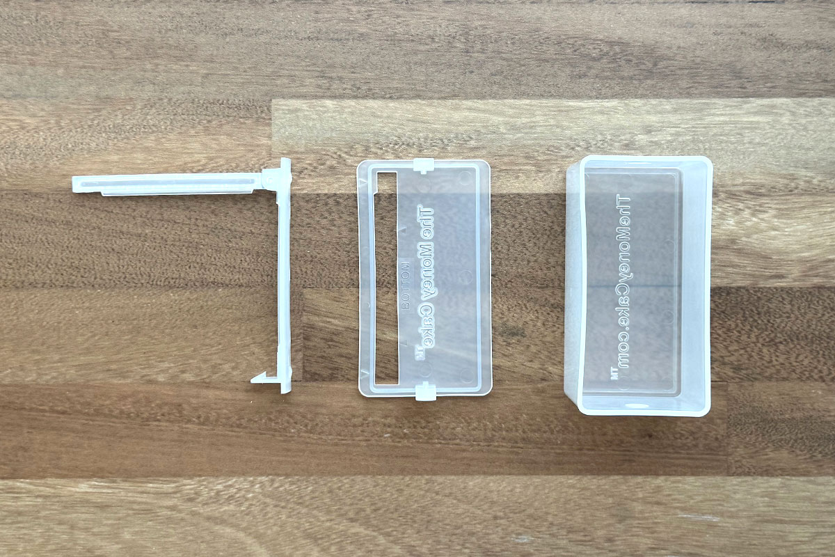 Box, lid, and clip for money cake.