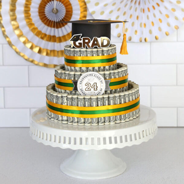 Three tiered cake made of money on a cake stand.