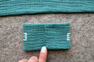 Small bow pieces with right and left sides folded in to overlap slightly in the middle.