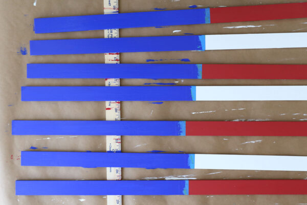 Yardsticks painted blue.