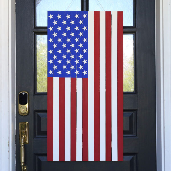Yardstick American flag hanging on a door.