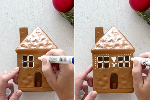 Using paint pen to outline windows and doors.