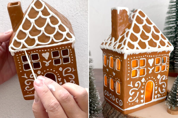 Using a toothpick to pull paint down to make it look like snow.
