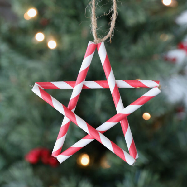 Star Christmas ornament made from paper straws.
