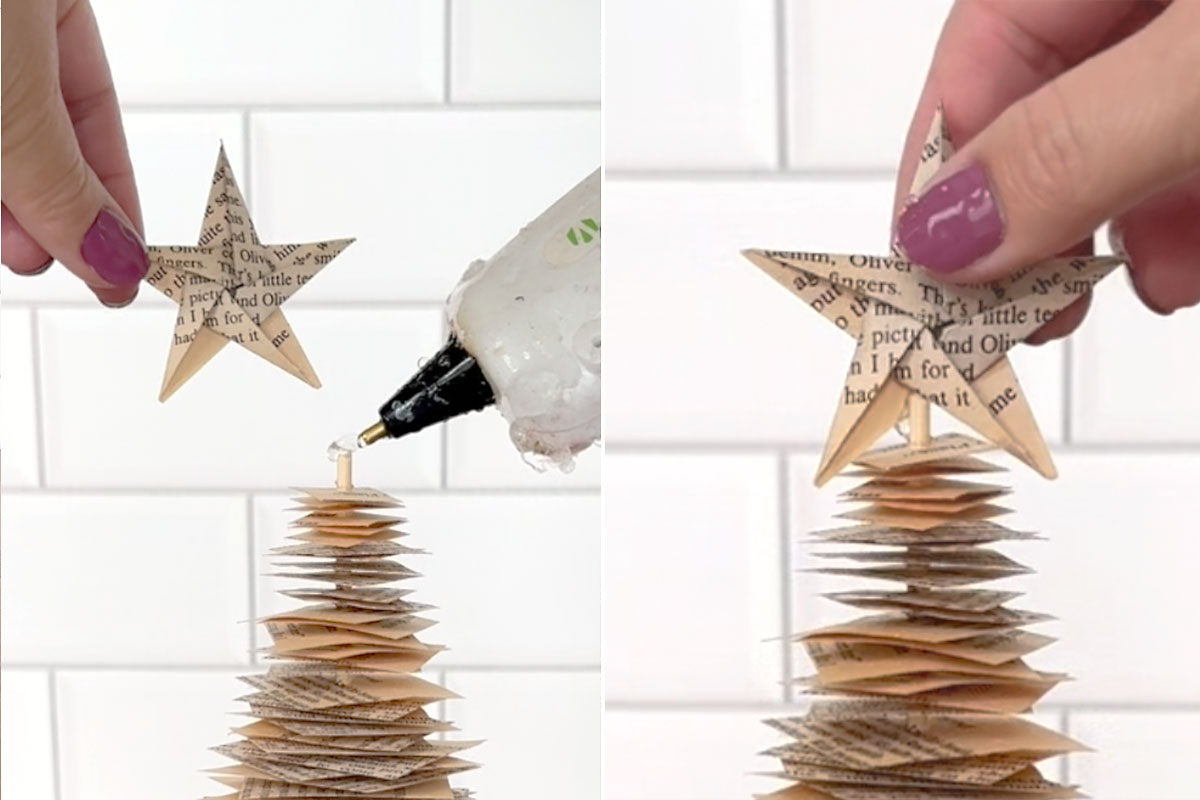Hot gluing origami star to top of tree.