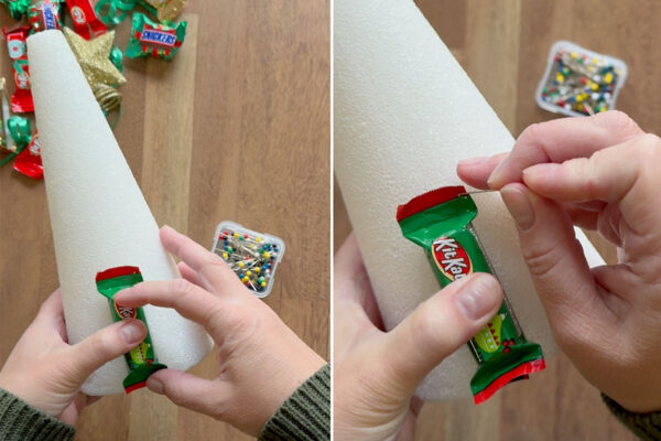 Using straight pins to attach candy to the foam cone.