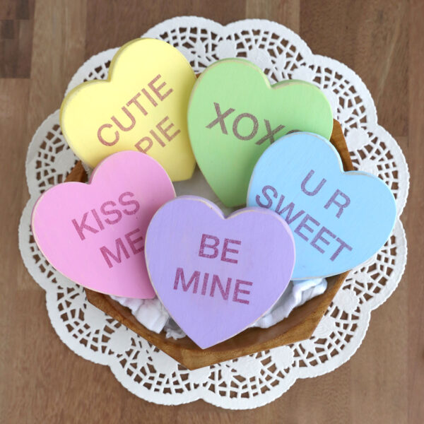Wood conversation hearts craft.