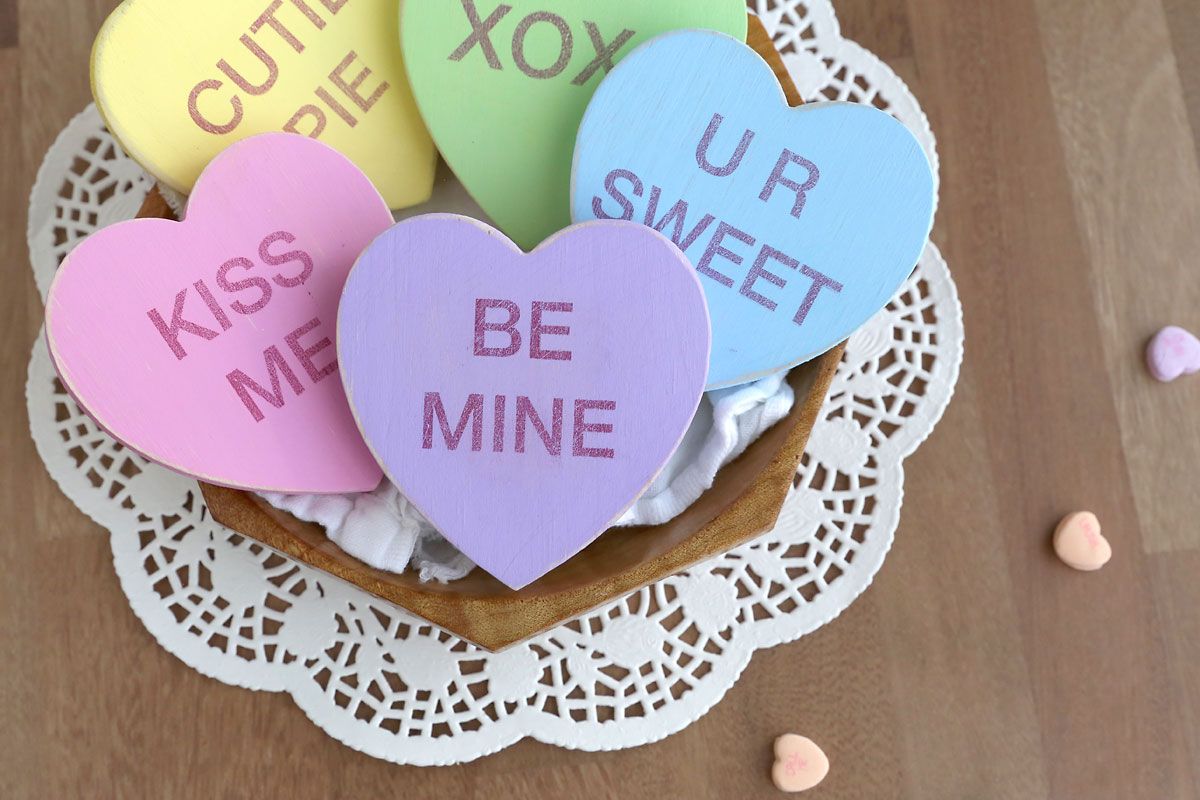 Wood conversation hearts craft.