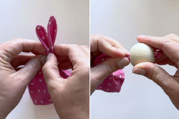 Folding the ears and threading through the hole in the bead.