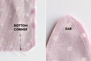 Clipping excess fabric across bottom corners and ears.