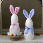 Two bunnies made from the Dollar Tree stacked eggs.