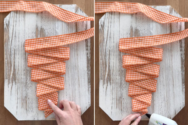 Glueing bottom of carrot shape to sign.
