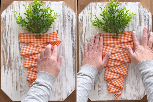 Gluing ribbon over bottom of greenery.