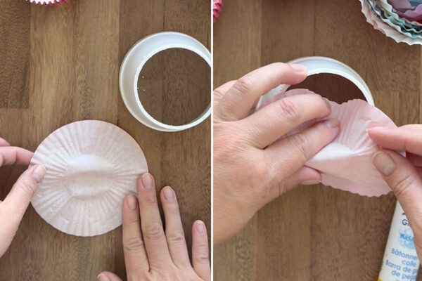 Folding flattened cupcake liner over edge of cup.