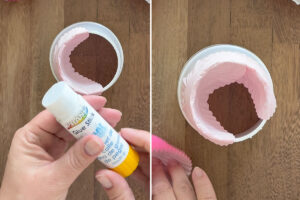 Using gluestick to adhere another cupcake liner.