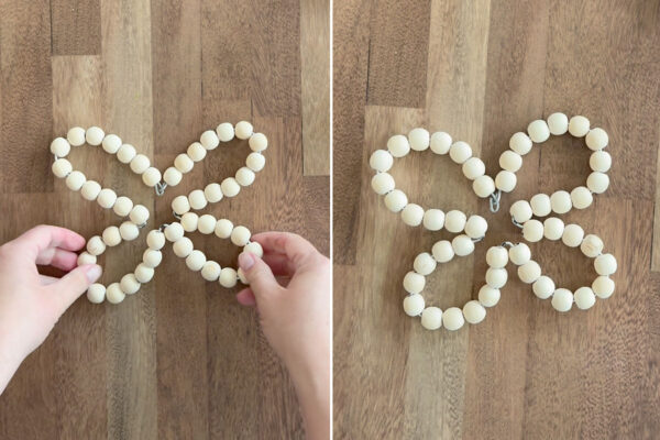 Bending top in toward center to create butterfly shape.