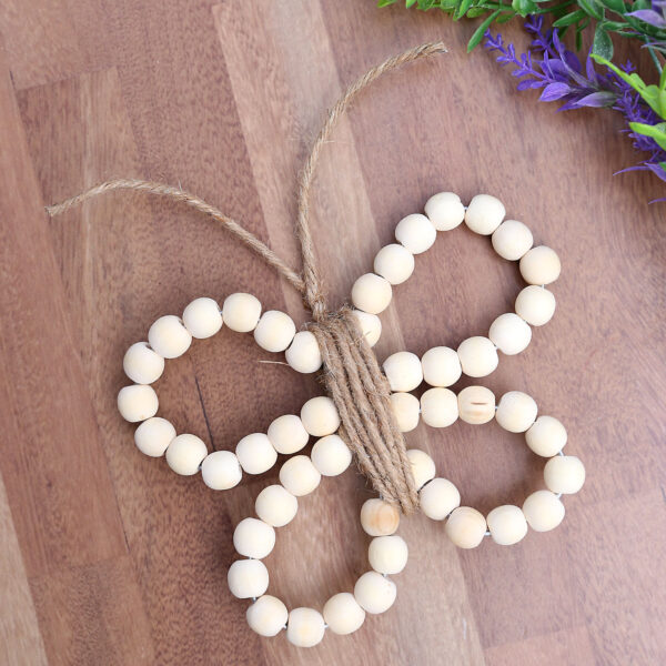Wood bead butterfly craft.