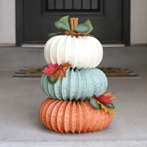 Pumpkin stack made from dryer vent hose.