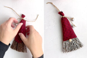 Tying top of hat with more twine; creating loop to hang.