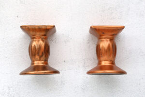 Black candle holder painted with brass metallic paint.