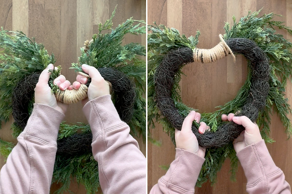 Bending wreath frame into heart shape.