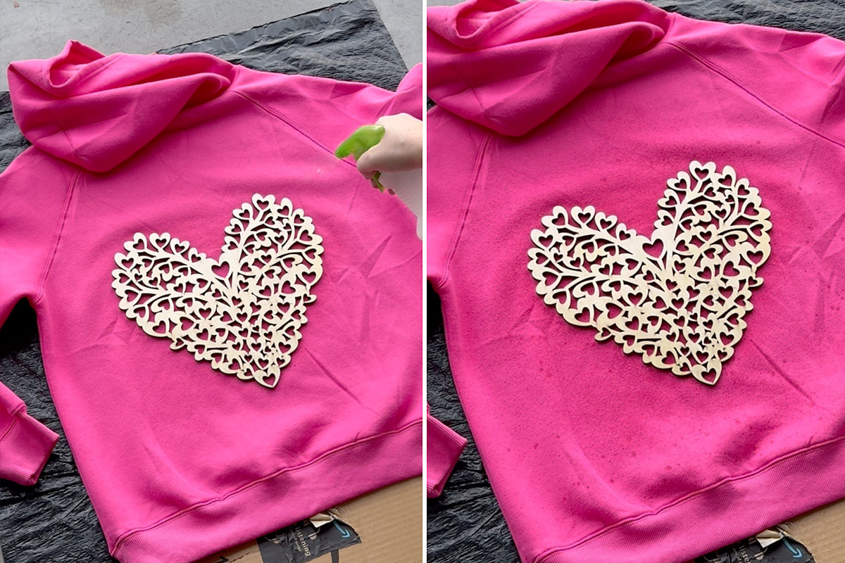 Spraying bleach water over the wood heart.