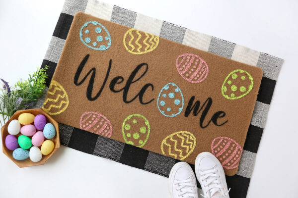 DIY Easter doormat with shoes and Easter eggs.