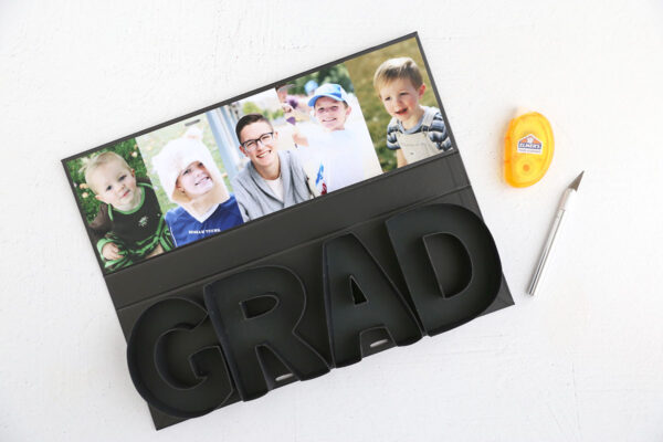 Photos adhered to inside of top cover.