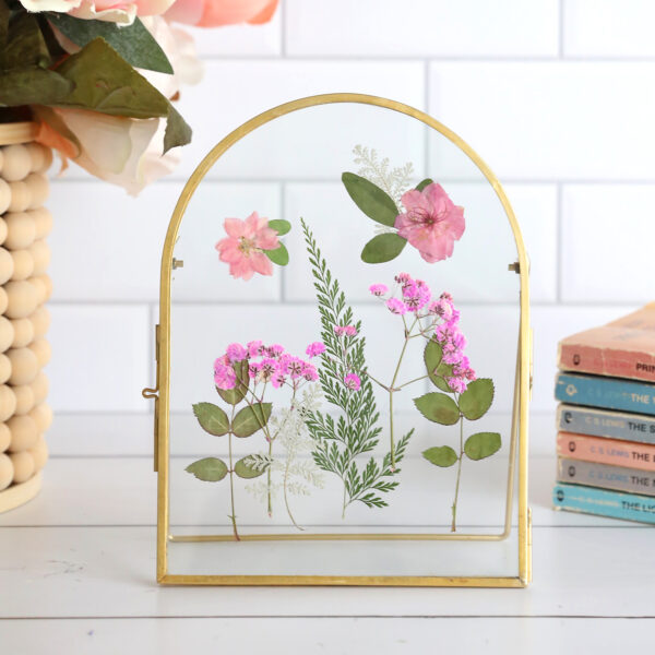 Pressed flowers in a frame.