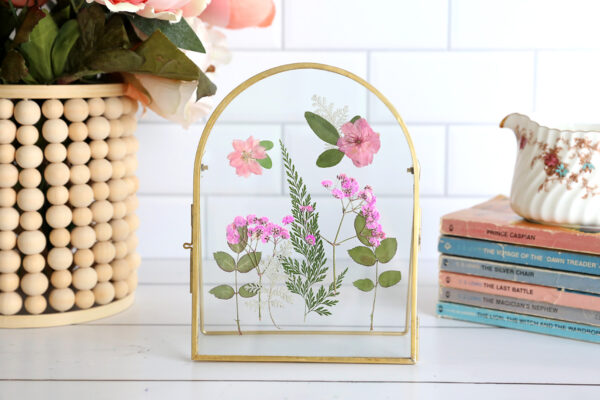 Pressed flowers in a frame.