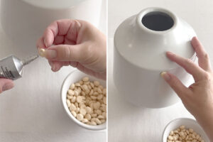 Putting glue on split wood ball, pressing onto vase.