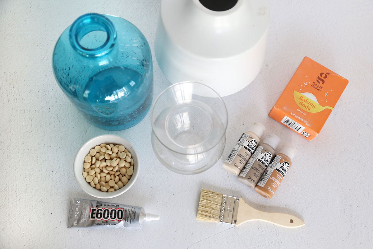 Vases, split wood balls, E6000, paint brush, paint, baking soda.