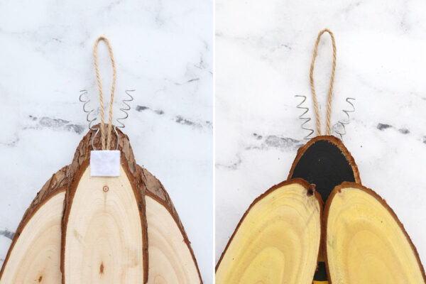Wire antennae and twine loop glued on back on bee.