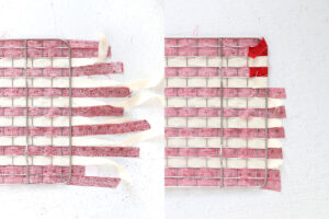 Flipping cooling rack over to glue down the ends of all the stripes.