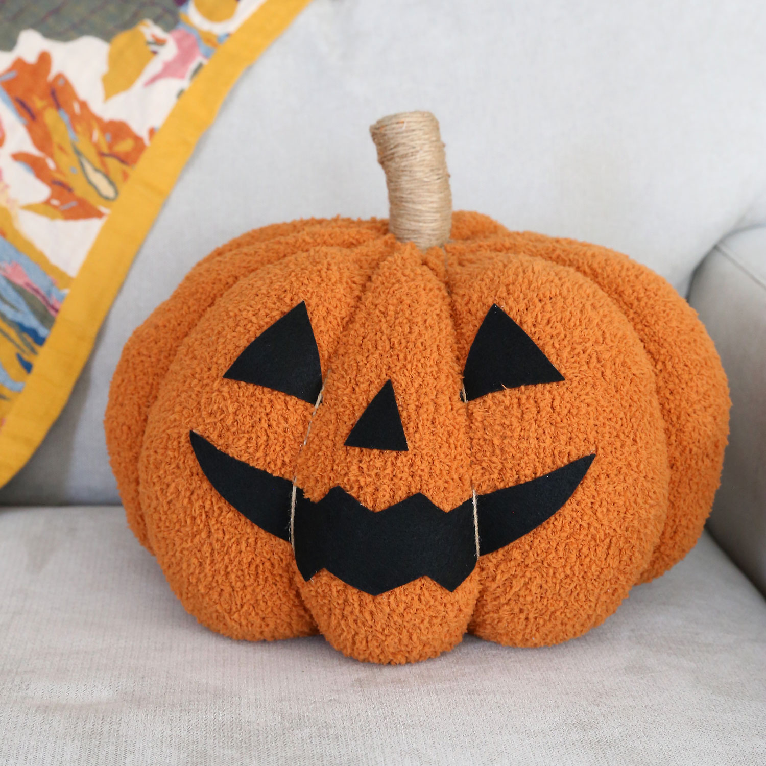 DIY Jack-o-lantern pillow.